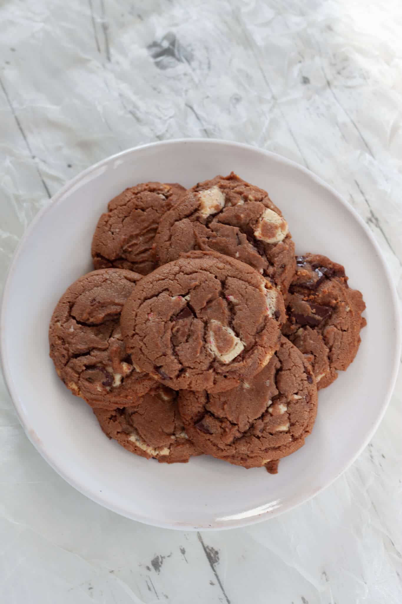 Peppermint Hot Chocolate Cookies with Ghirardelli on a plate.