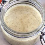 dill pickle salad dressing ready to use in a lidded glass jar.