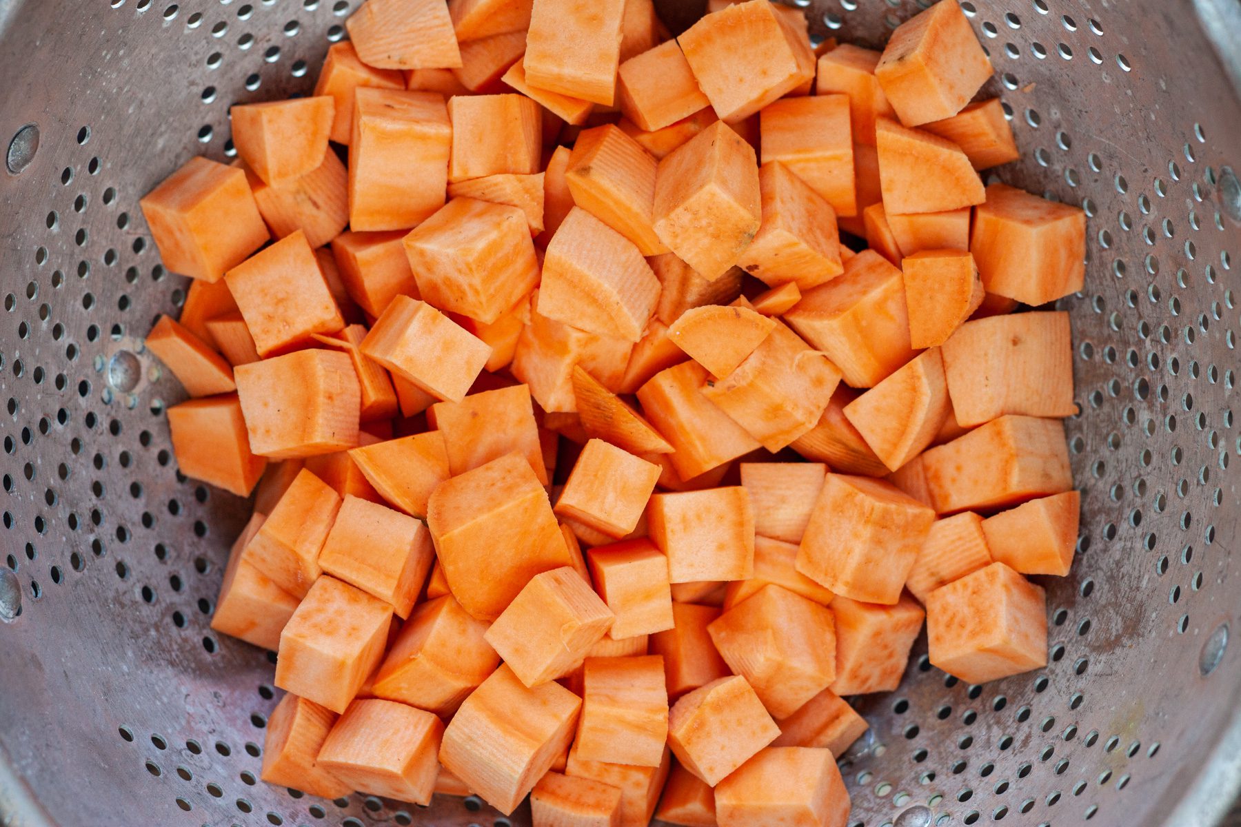 rinse sweet potato cubes with water before cooking