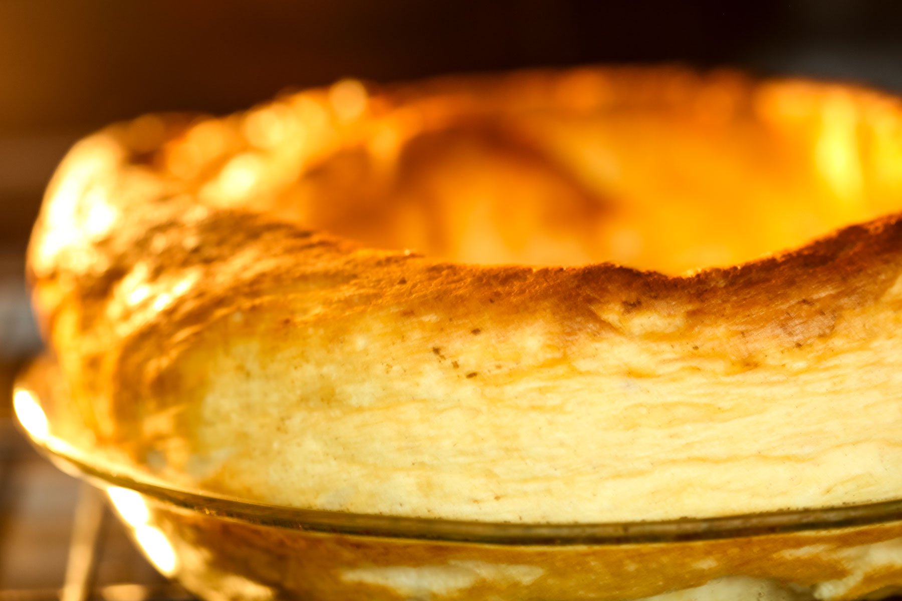 Dutch baby cooking in the oven.