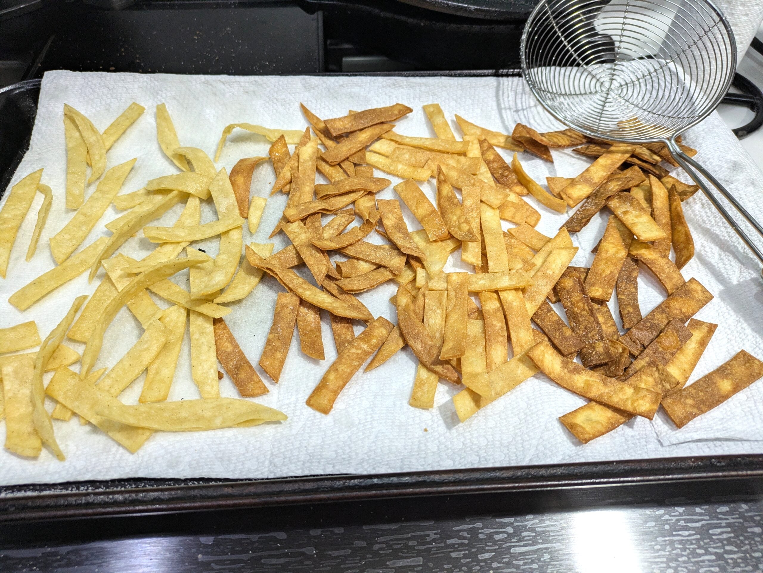 thicker corn tortilla strips fried inconsistently