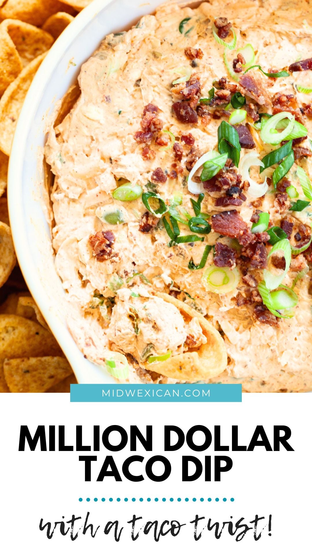 taco dip with bacon bits and sliced green onion served in a bowl next to scoops corn chips.